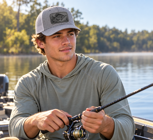 Crappie — male fishing model wearing Heather Grey/Light Grey hat with Charcoal patch; mockup